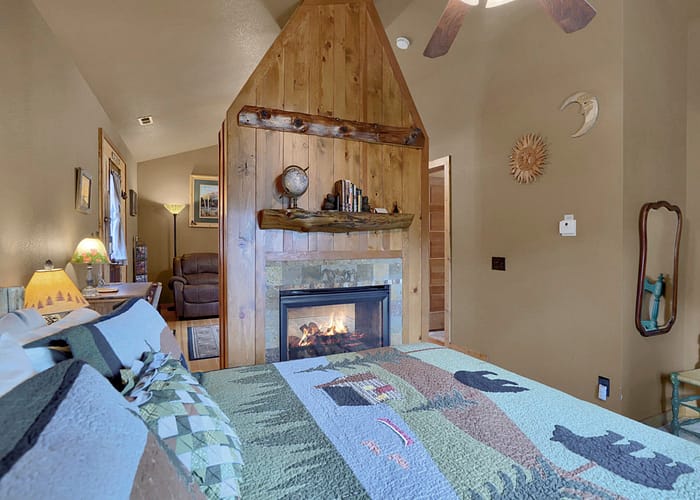 rocky-mtn-lodge-Suite-Bedroom-Fireplace-2