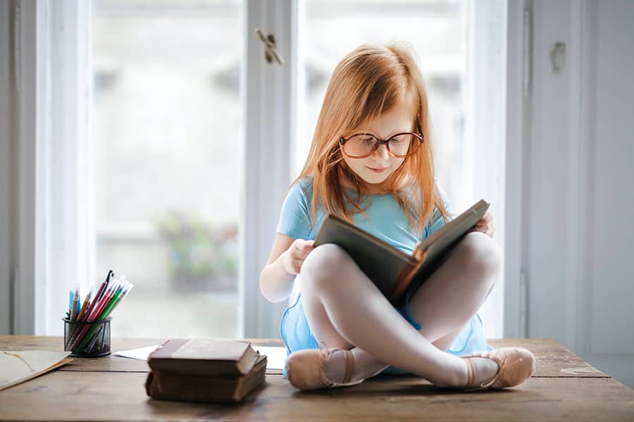 Child reading a book
